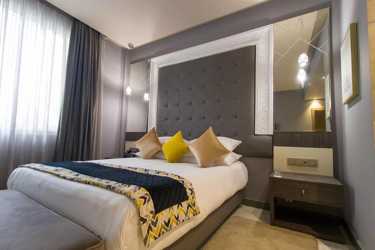 Mandarin Palace Hotel & Spa Tanger Eksteriør bilde A bedroom at the hotel